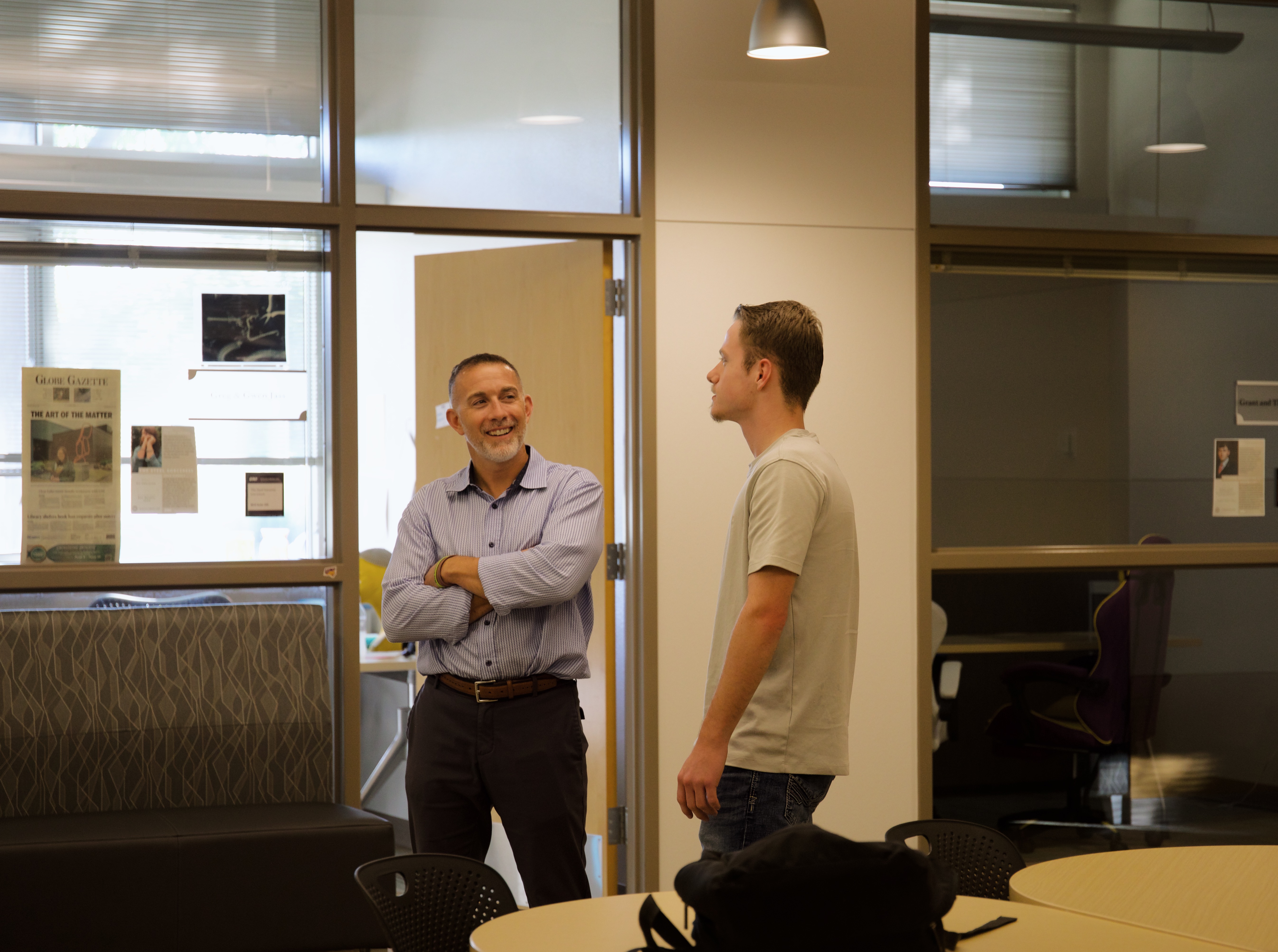 Bart talking with student